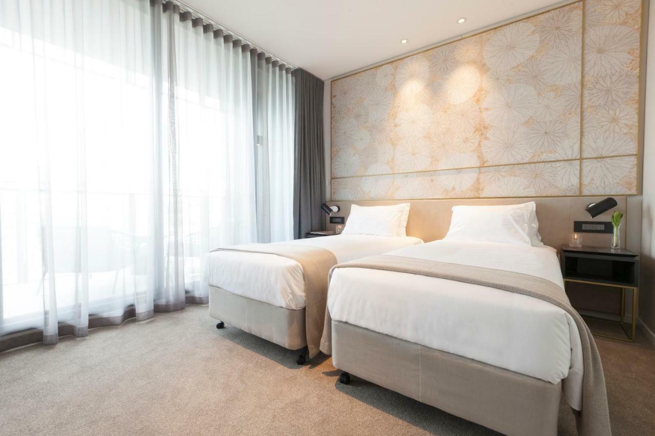 One Global Resorts Green Square Sydney Kültér fotó Deluxe Room