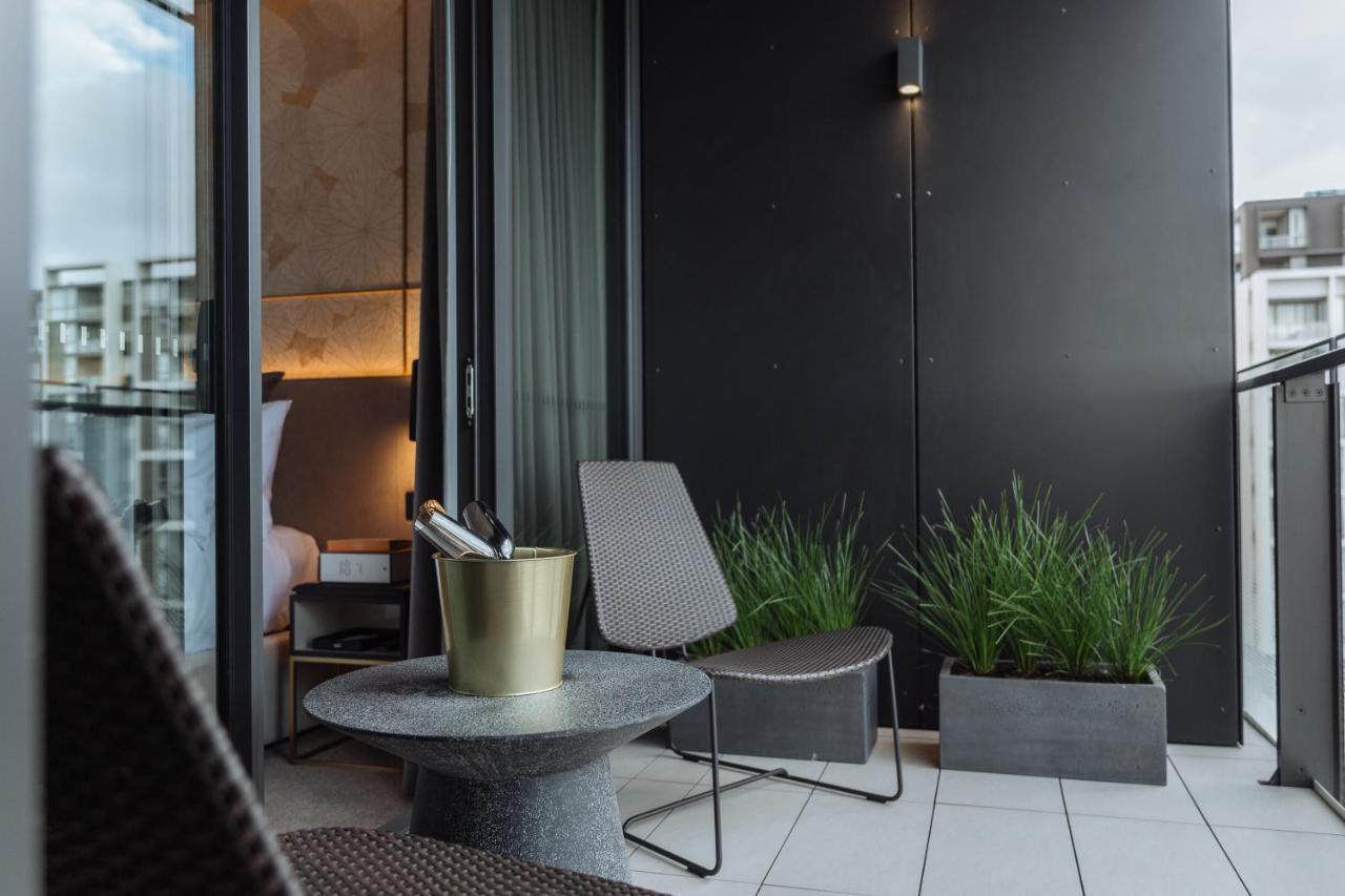 One Global Resorts Green Square Sydney Kültér fotó The balcony of a penthouse apartment at The Standard London