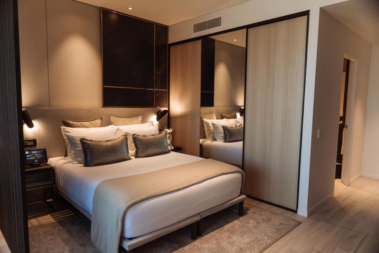 One Global Resorts Green Square Sydney Kültér fotó A bedroom at the hotel