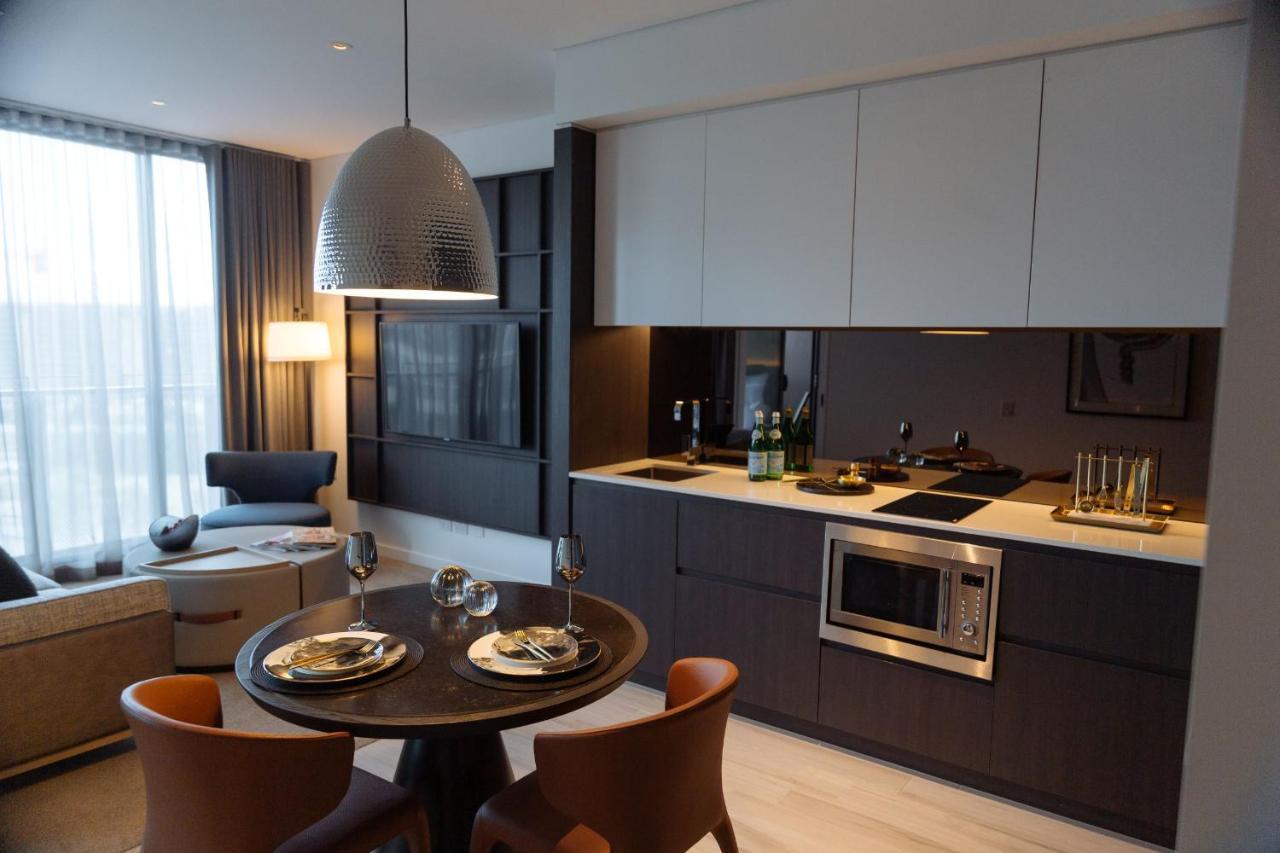 One Global Resorts Green Square Sydney Kültér fotó A kitchen in a typical apartment