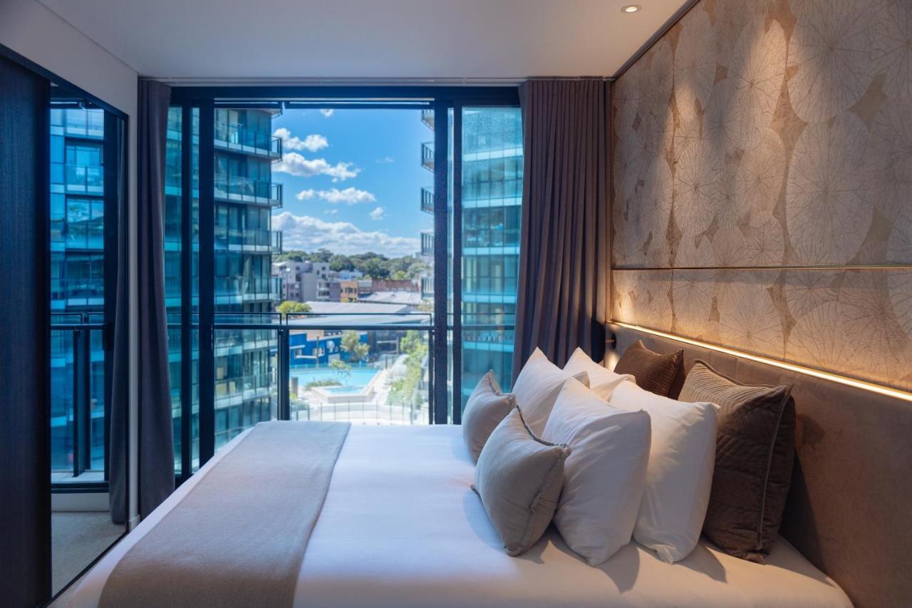 One Global Resorts Green Square Sydney Kültér fotó A bedroom at the hotel